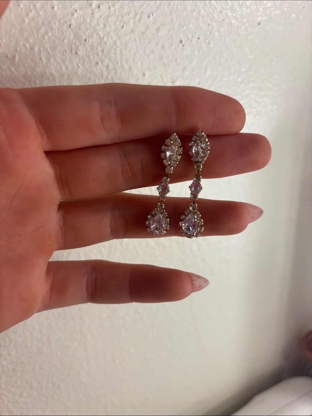 Gold-Tone white diamond earrings with matching necklace